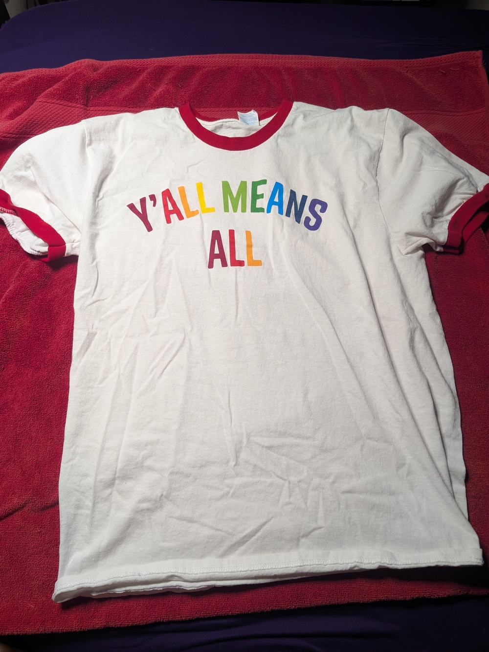 White Ringer Tee with Red Trim and Rainbow "Y'ALL MEANS ALL"